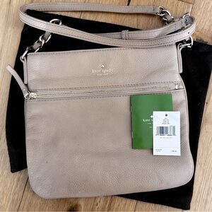 Kate Spade New York 
Cross body bag : Color Beige